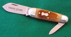 #252209HS Tidoute Sleeveboard, 1095 carbon steel, 3" closed length, Frontier Bone.