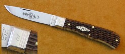 #735109 Northfield UN-X-LD Scout Antique Amber Peach Seed Jigged Bone, flat beveled edge bolster, 1095 carbon steel, skinner blade, 3 3/4" closed length.