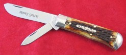 #734208J Tidioute Cutlery, Burnt Arrowhead Jig Bone, 1095 carbon steel, released 3-26-09.