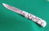 #735108ECL Tidioute Cutlery, Scout, Cracked Marble, End Cap, Liner Lock, 1095 Carbon Steel.