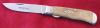 #735109ECL Scout Trapper, Primitive Bone, 1095 carbon steel, 3 3/4" closed length. Released on 4/29/09.