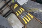 71 Yellow Linen Micarta in polishing.