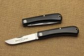 715126 Farm & Field Tool, Bull Nose Work Knife, Black Linen Micarta, 3 7/8" closed length, 1095 carbon steel. Drop point blade.